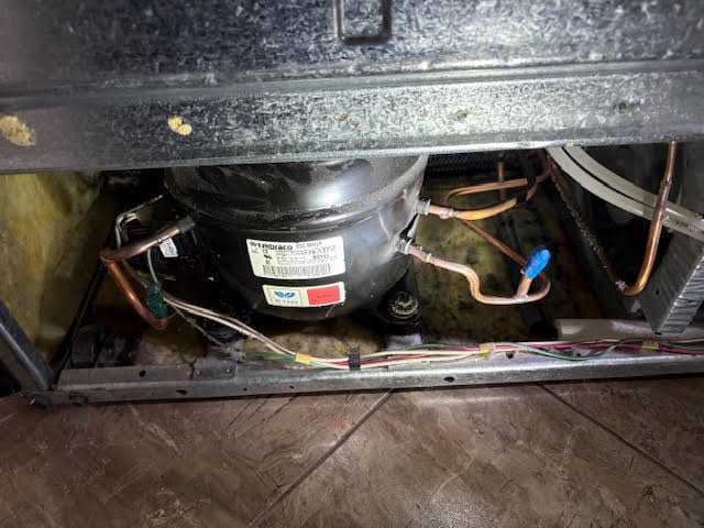 Refrigerator compressor and copper refrigerant lines