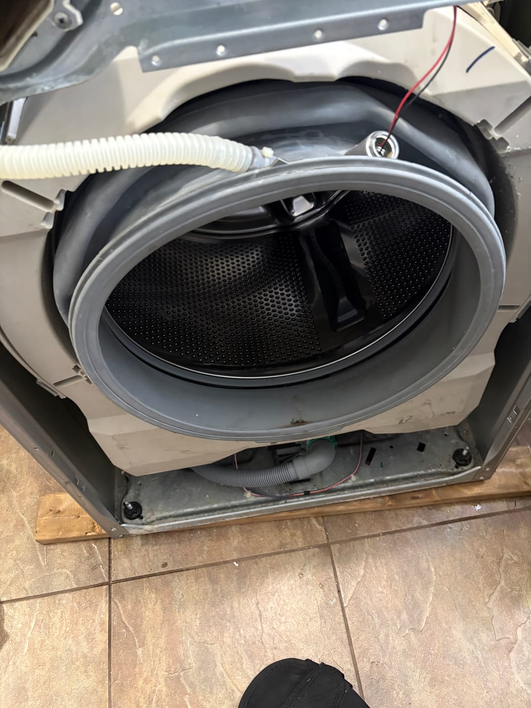Front-loading washer with its front panel removed